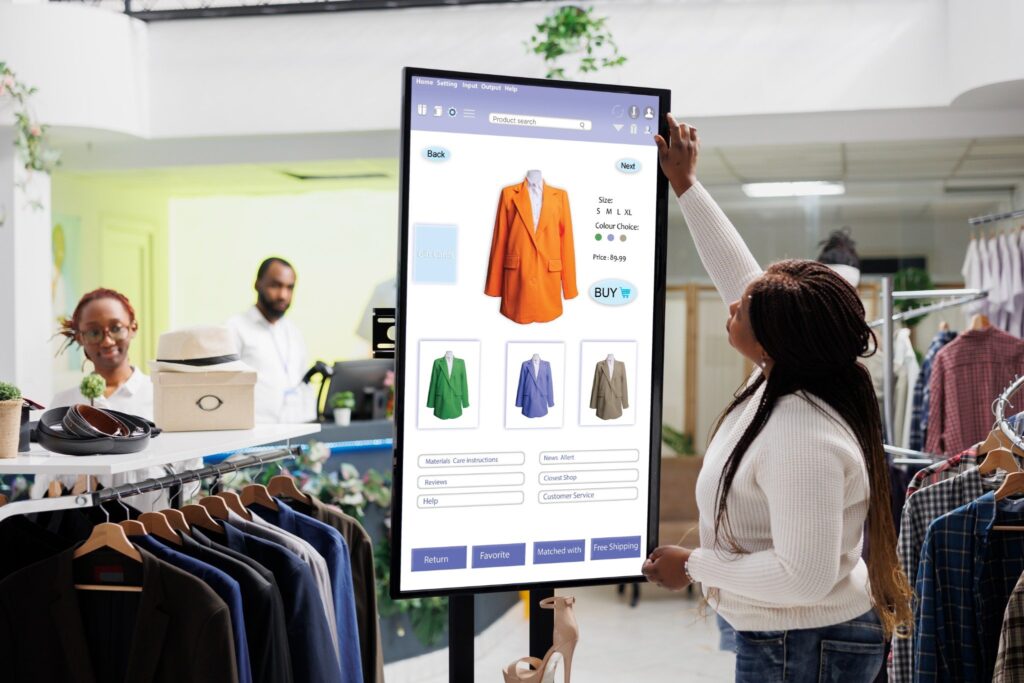 female customer reviewing digital screen