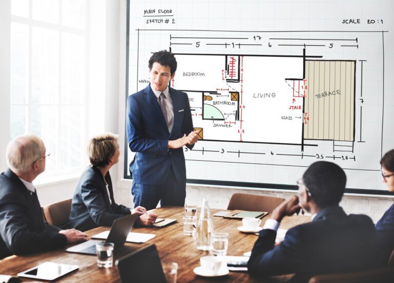 meeting in office with digital screen