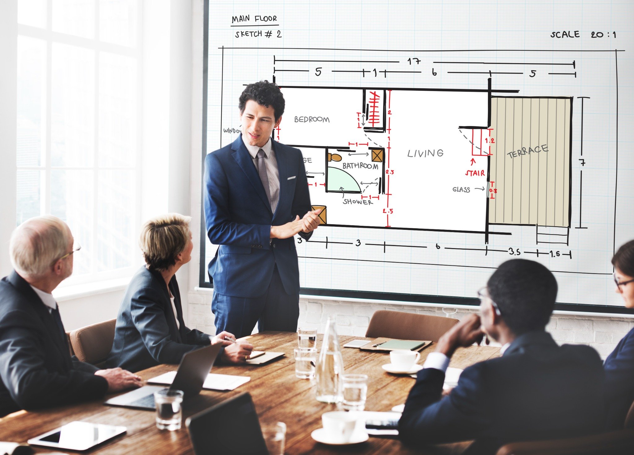 meeting in office with digital screen