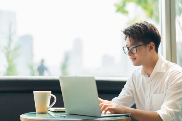 man working on laptop